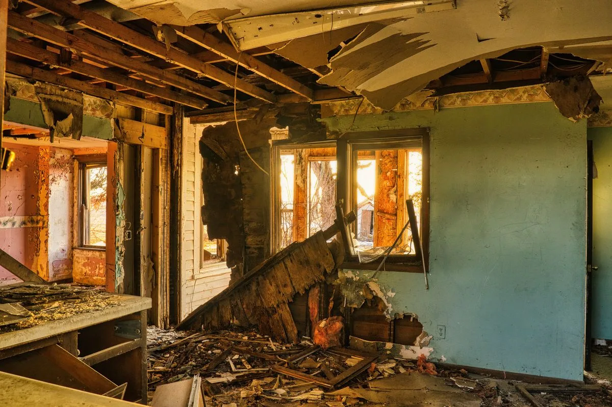 Home interior torn open during water damage restoration